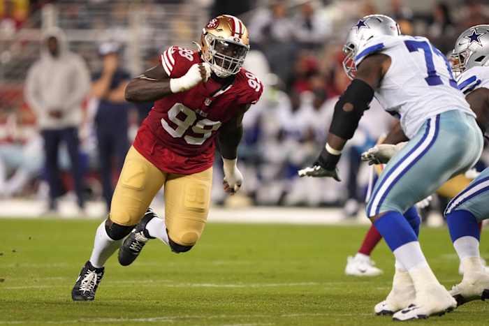 San Francisco 49ers defensive tackle Javon Kinlaw (99) rushes against Dallas Cowboys offensive tackle Tyron Smith (left) during the fourth quarter at Levi's Stadium. Mandatory Credit: Darren Yamashita-USA TODAY Sports